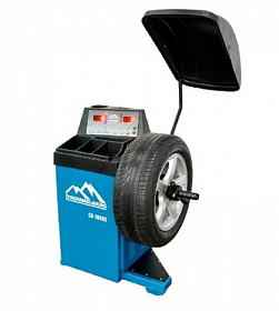 На сайте Трейдимпорт можно недорого купить Cтанок балансировочный для колес до 70 кг Trommelberg CB1930E. 